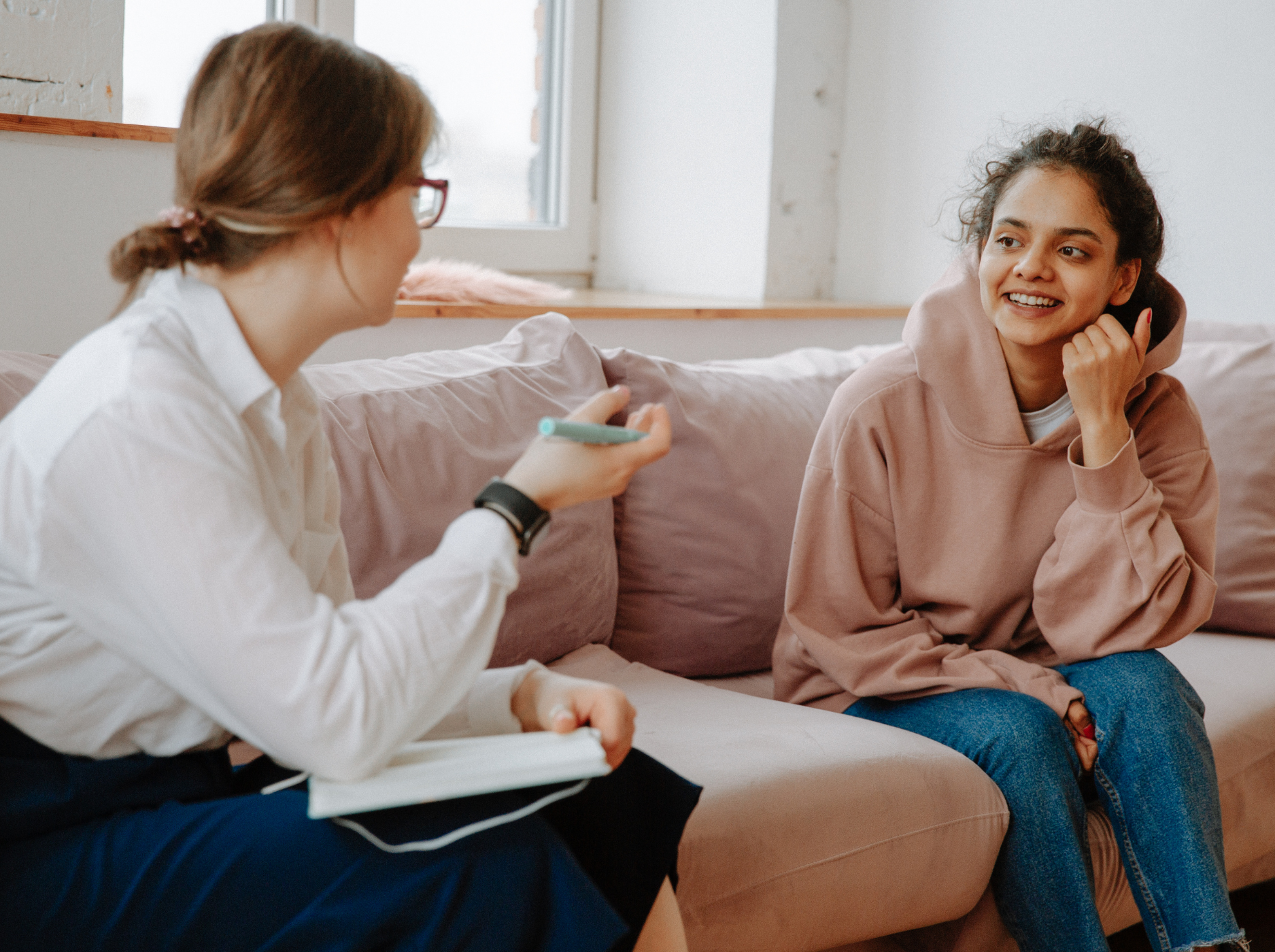 Text reads 'Non-academic support' over a pink-tinted photograph of a campus sculpture.