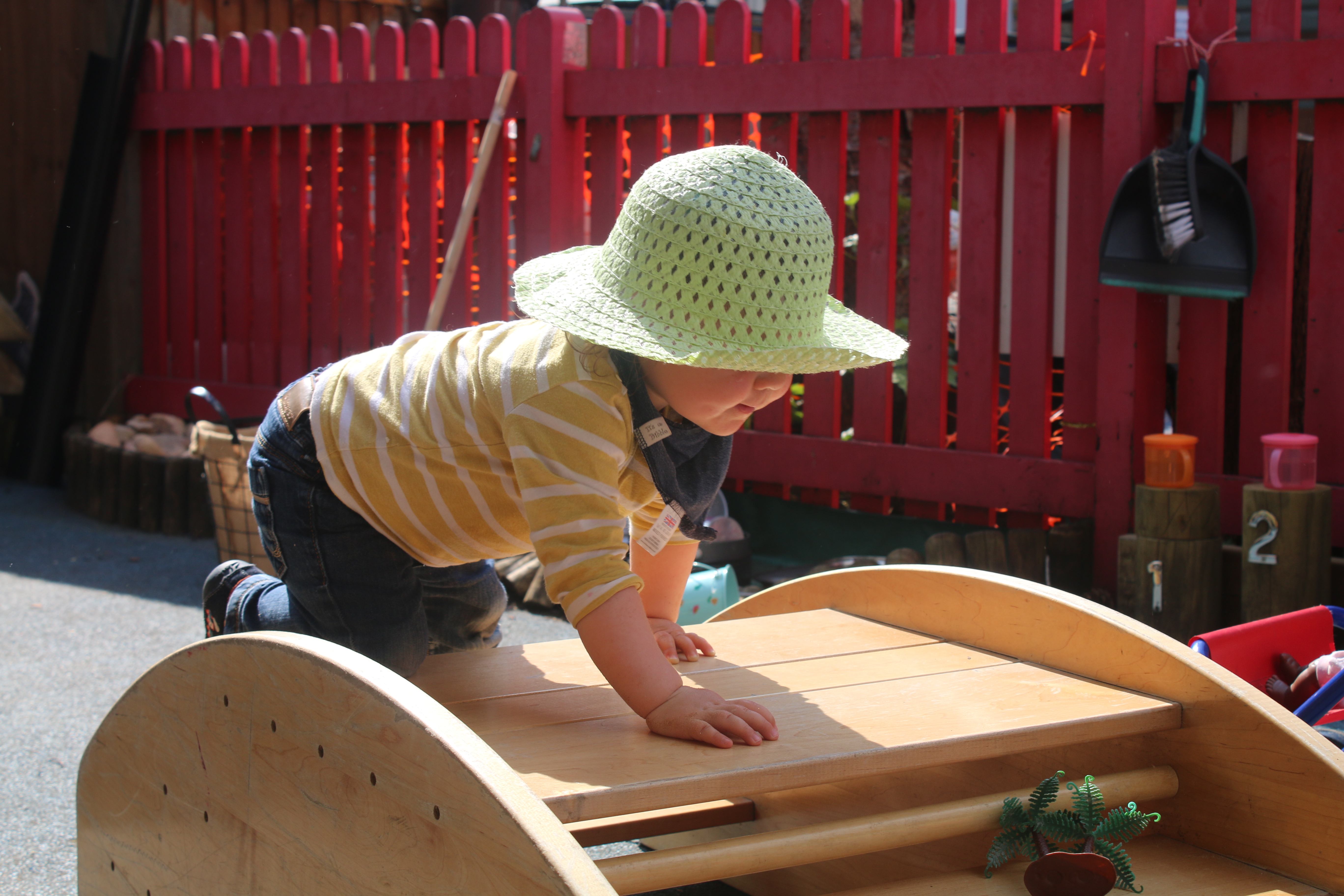 Photograph of child playing outdoors